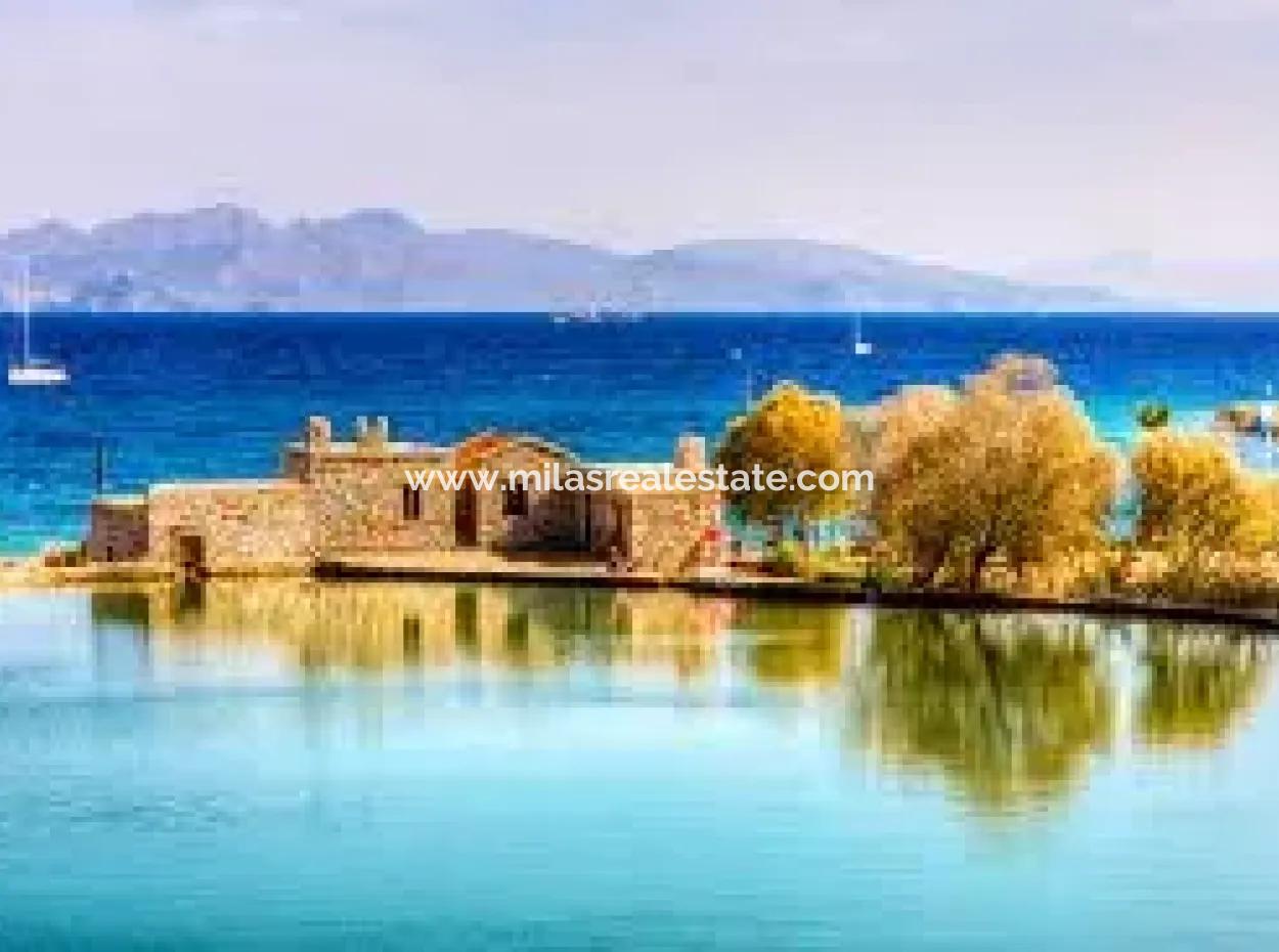 Datça İlçesi Kızlan Mevkisinde Denize Sıfır 10000M2 Turizm İmarlı Denize Sıfır Otel Yapımına Uygun Satılık Arsa